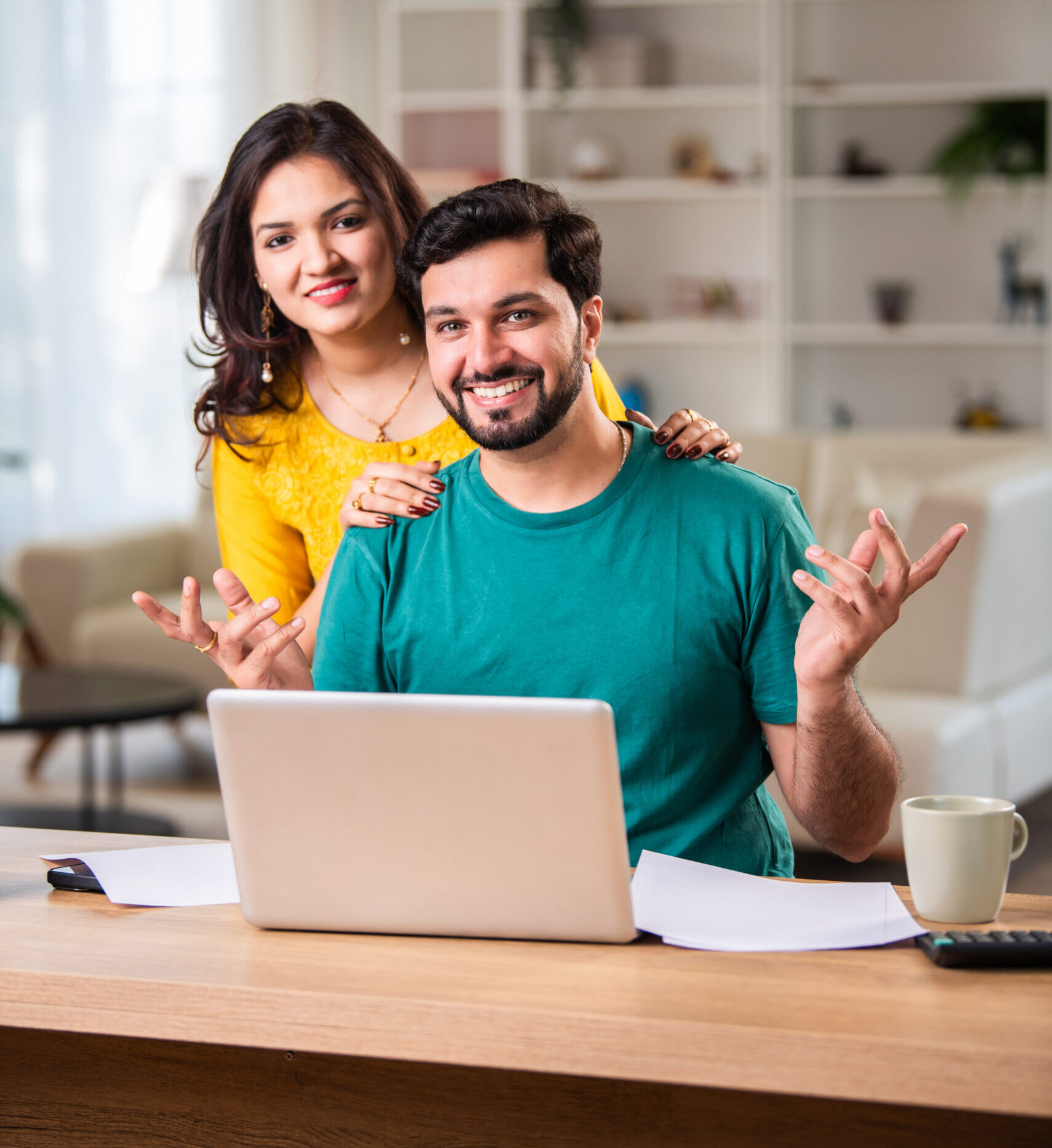 young indian couple checking mortgage or loan agre 2025 01 16 12 42 00 utc 1 scaled e1741118528144